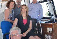 Fisher at chamber helm