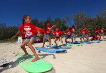 Surf’s up for 21 kids