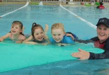 Kids dive in to swimming classes