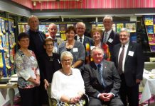 Cooke hands over baton and big kitty