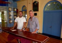 Surfers ride the waves of history