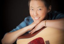 A girl, her car and her guitar