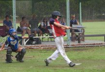 Rain turns game into ’slide ball’