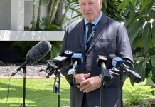 Roommates wake to unknown man beside bed touching them