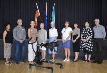 Student stands during National Anthem thanks to donation