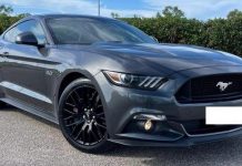 Mustang stolen at gunpoint