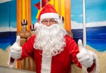 Santa is catching waves into Mooloolaba Beach