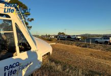 Injured man airlifted after car collides with truck