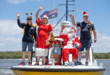 Santa hits the water with Coast Guard Noosa for annual Christmas lolly run