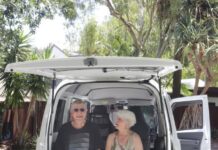 Couple embrace electric mini-cab