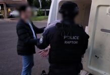 Four men extradited from Sydney over alleged extortion on the Sunshine Coast