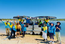 Volunteers tackle invasive weed at Noosa River Mouth