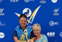 Clinton wins gold for his dad