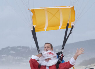 Santa drops in for carols