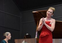 Janet holds the notes