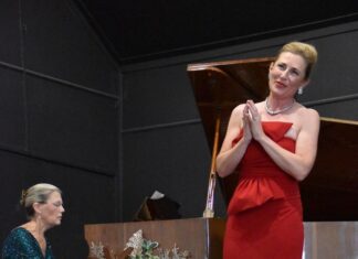 Janet holds the notes